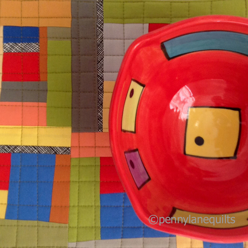 table mat with bowl from Egg and I Pottery